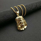 Vacuum-plated golden pendant detail on chain