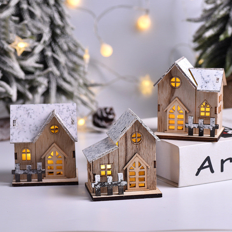 Wooden Christmas house decoration with gentle glow