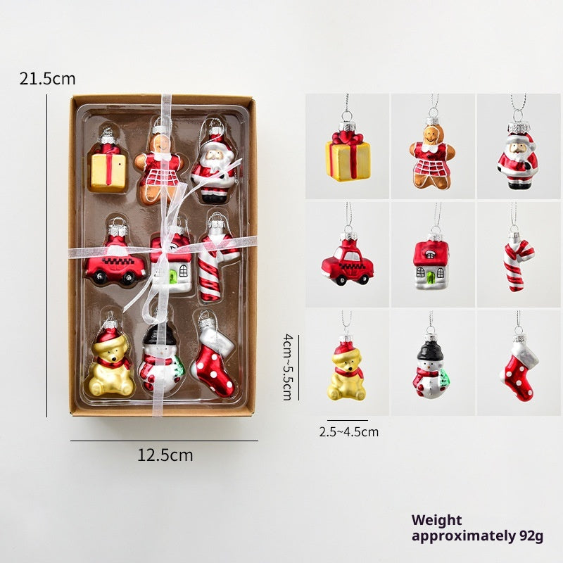 Glass snowman pendant showing charming winter design on sparkling Christmas tree Main image