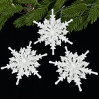 White snowflake ornament detail showing intricate crystalline pattern