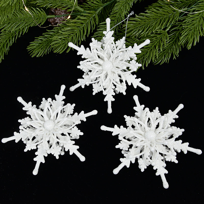 White snowflake ornament detail showing intricate crystalline pattern