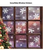 Multiple white snowflake stickers ready for Christmas window application