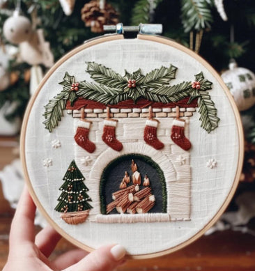 Multi-design Christmas embroidery craft kit with needle and fabric