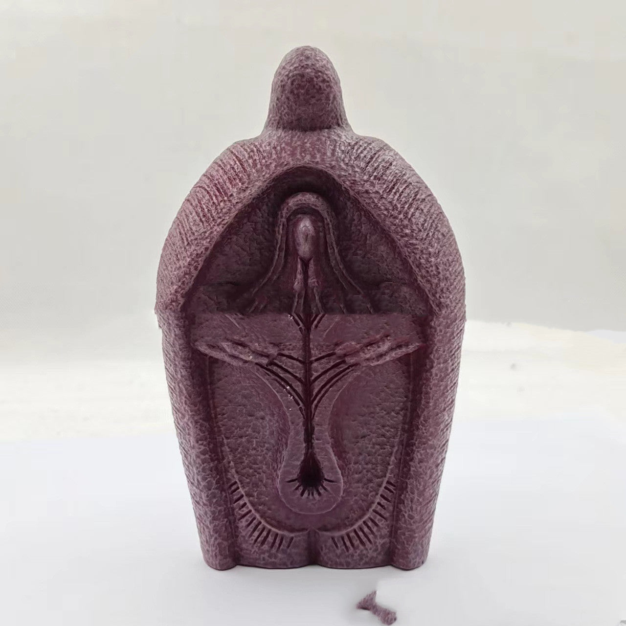 Resin Jesus figurine ornament displayed as wall hanging in modern home setting Main image