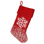Close-up of decorative Christmas sock with snowflake and tree motifs