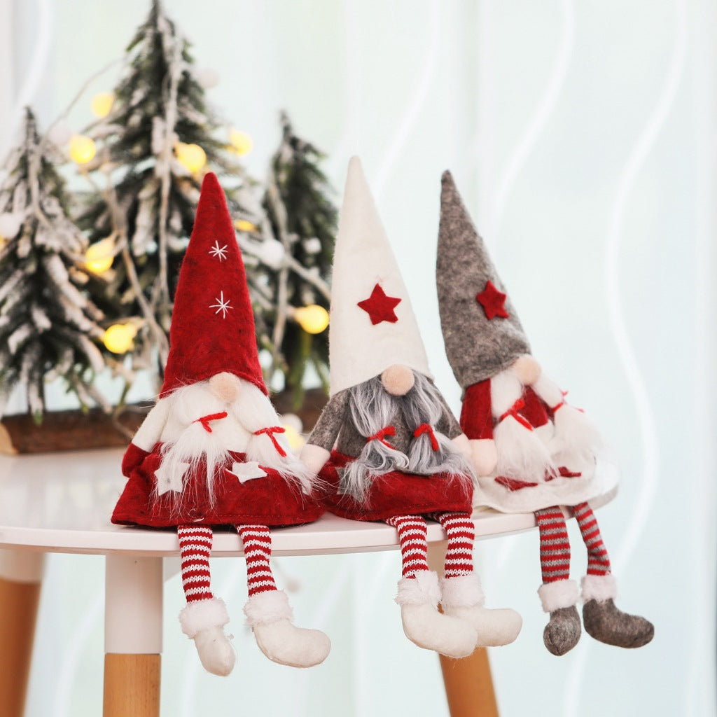 Colorful Christmas doll options including gray white and red hat styles