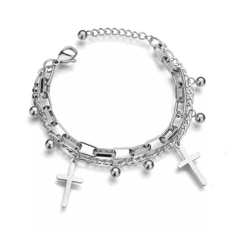 close up detail of the Jesus symbol pendant on the bracelet