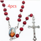 Wooden rosary pendant detail showing cross and beads