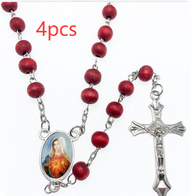 Wooden rosary pendant detail showing cross and beads