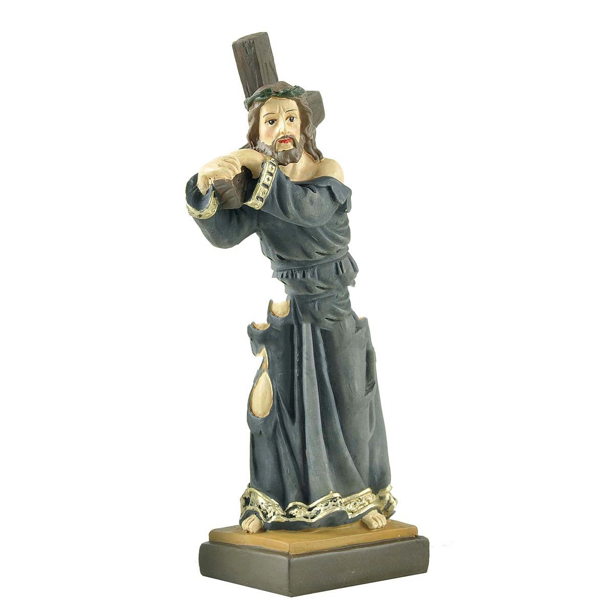 Resin craft of Jesus displayed on wooden surface, soft lighting