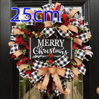 Cloth bow garland in classic Christmas styling displayed on mantel