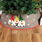 Non-woven fabric tree apron showing festive Nordic elders design detail close-up