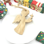 Handmade birch wood ornaments hanging together showing the complete European Christmas collection
