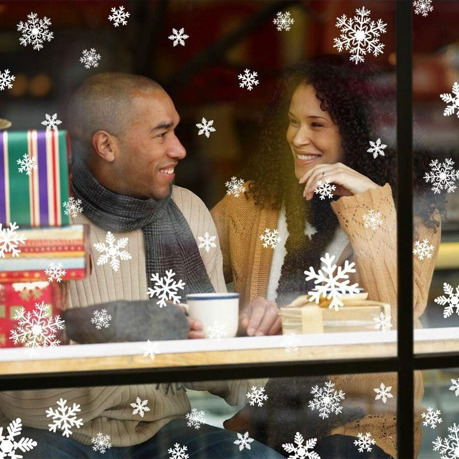 Elegant white snowflake static stickers arranged on a window surface for Christmas decoration Main image