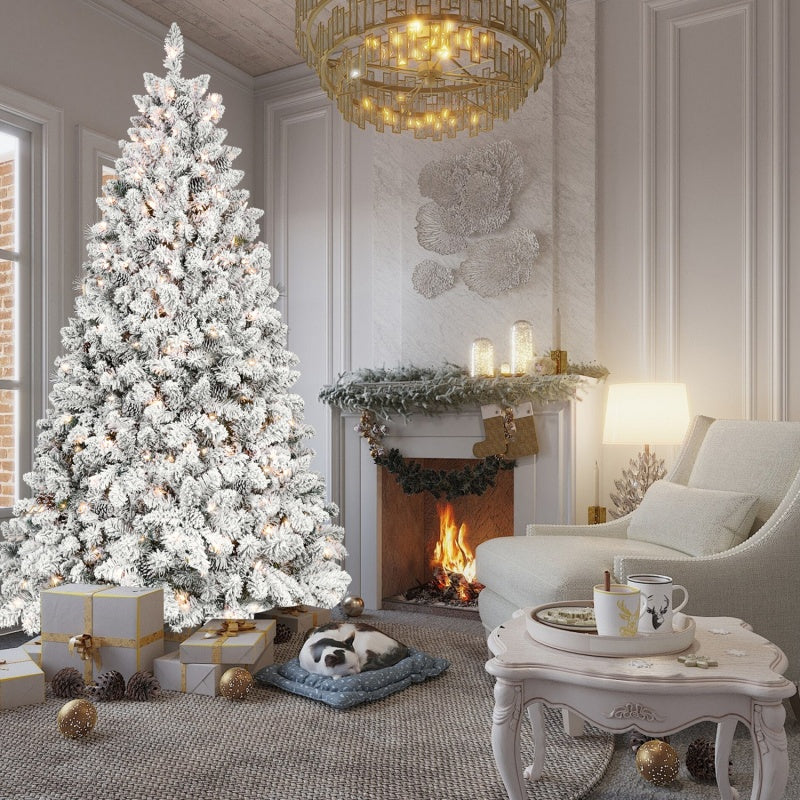 Close-up of flocked tree branches with natural pine cones and twinkling lights