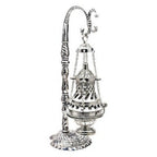 Ornate hanging censer displayed as wall decoration