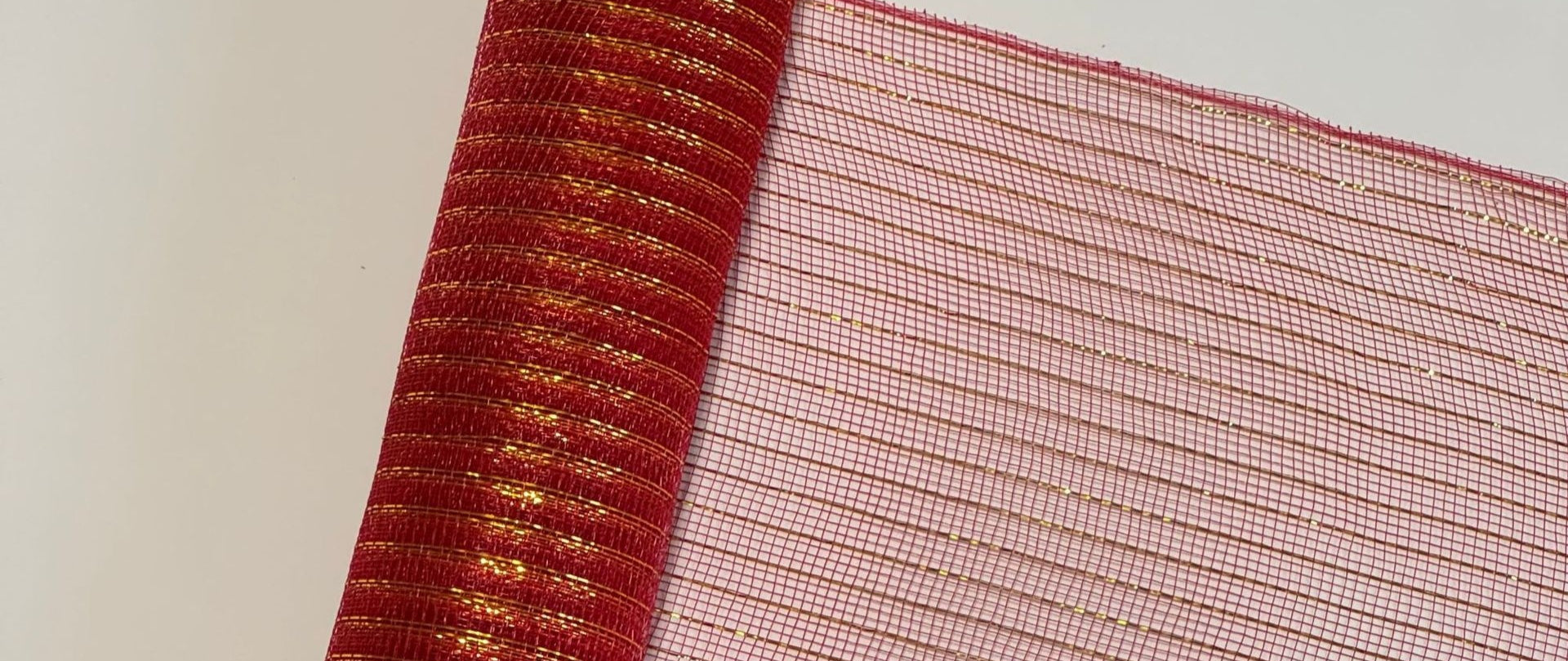 Red and gold ribbon for Christmas tree decorating and gift wrapping