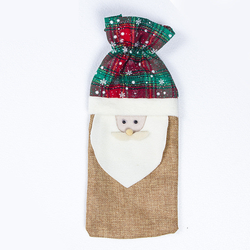 Holiday wine bottle carrier in cloth for Christmas celebrations and gifting