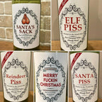 Set of Christmas bottle label stickers showing festive decorative elements