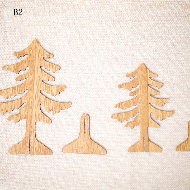 Carved wooden Christmas tree ornament with religious insert design detail