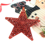Three-dimensional plastic star decoration catching light at various angles