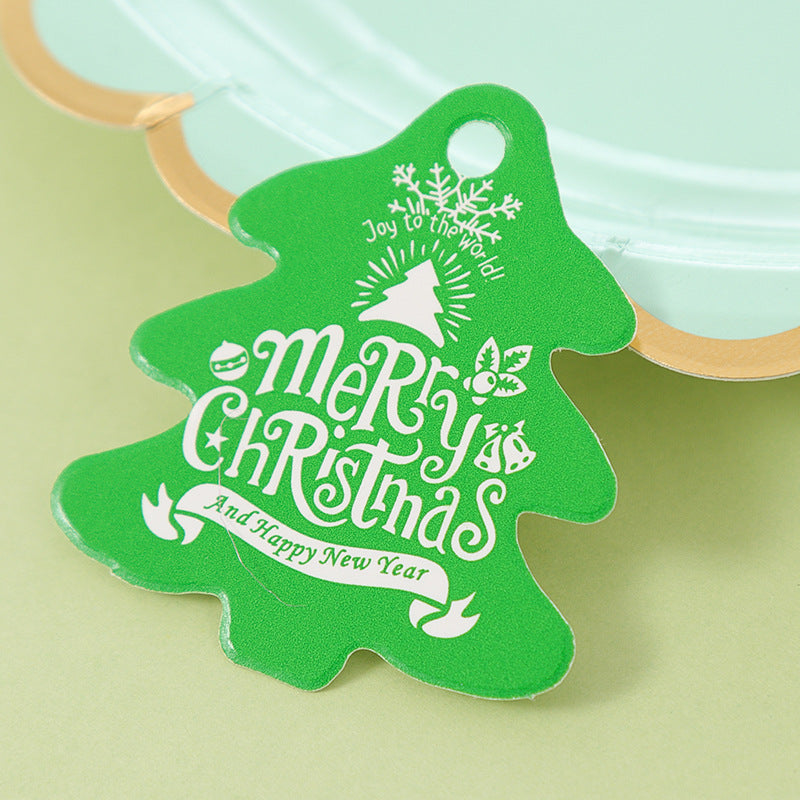 Christmas round Santa Claus gift tag on festive background
