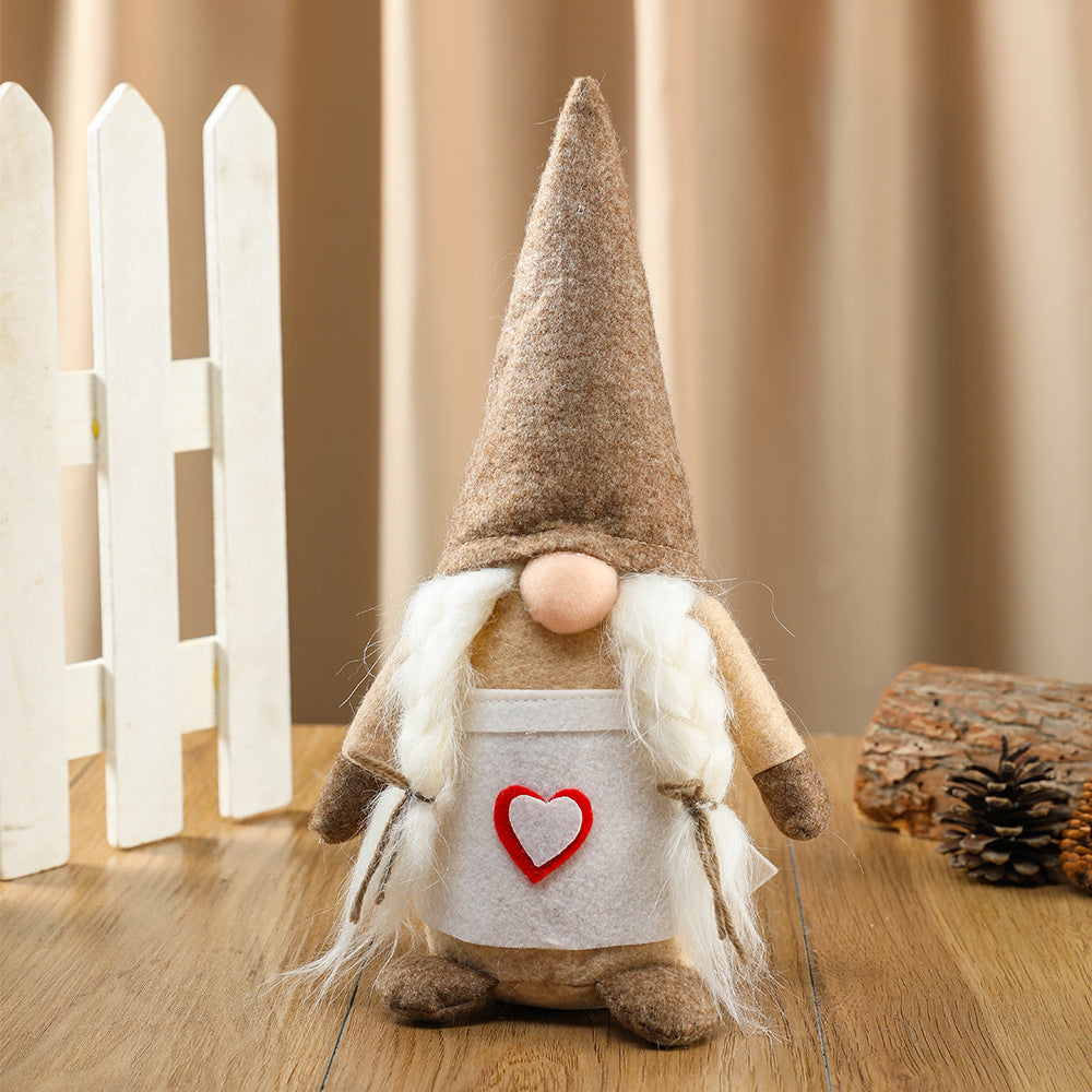 Front view of a three-dimensional faceless cloth doll Christmas ornament in Love Chef colorway