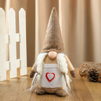Front view of a three-dimensional faceless cloth doll Christmas ornament in Love Chef colorway