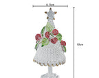 Close-up of red flower Christmas tree design in glass