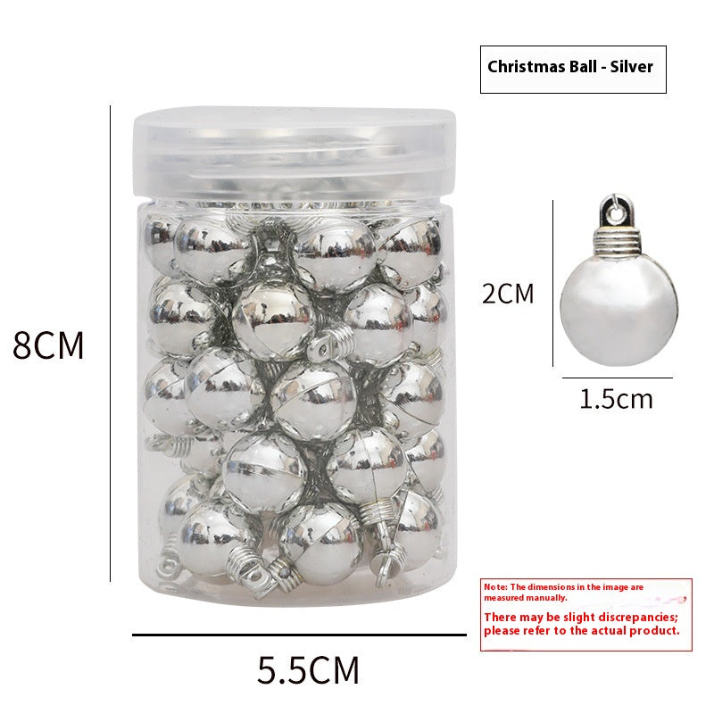 Close-up of glossy red and gold Christmas tree balls