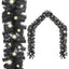 LED Christmas garland wrapped around staircase with warm glow