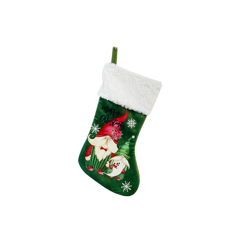 Red faceless Christmas stocking ornament with holiday charm