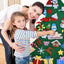 Felt Christmas tree decoration displayed on wall in festive home setting