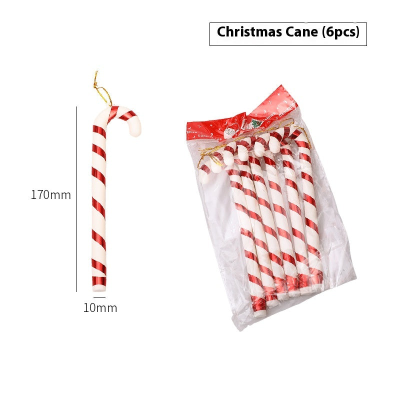 Festive red and white crutches arranged as Christmas tree ornaments