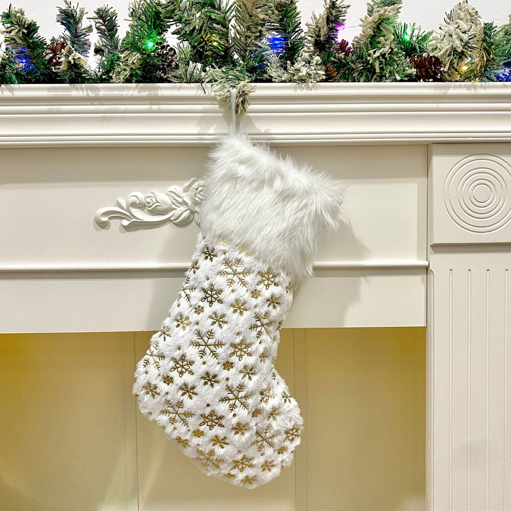 Holiday home decor featuring plush Christmas stocking gift bag