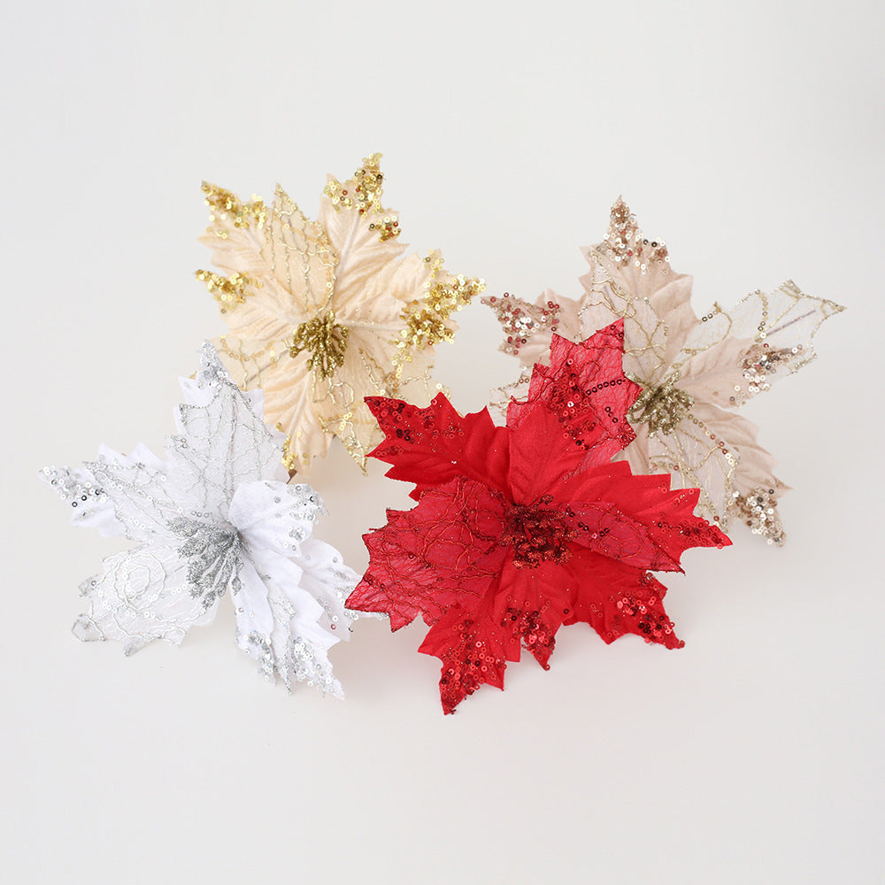 Golden glitter Christmas flower arrangement displayed on rustic Christmas decor with warm tones