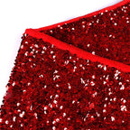 Festive red sequin tree skirt ready for Christmas holiday decorating season
