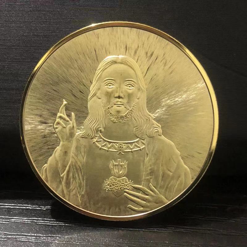 Gold plated Jesus coin with religious inscription detail