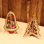 Vintage-style wooden Christmas star and bell ornaments on white background