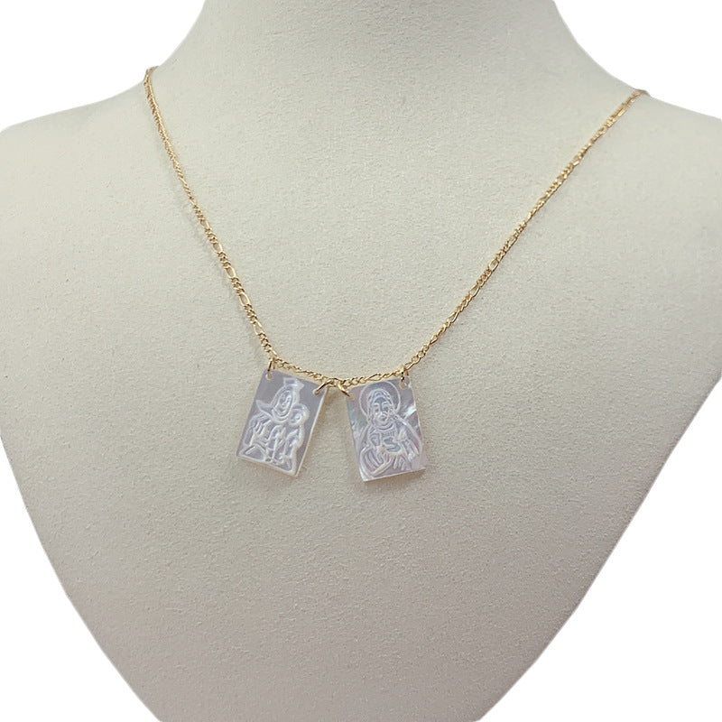 Woman wearing Virgin Jesus mother of pearl necklace in casual setting