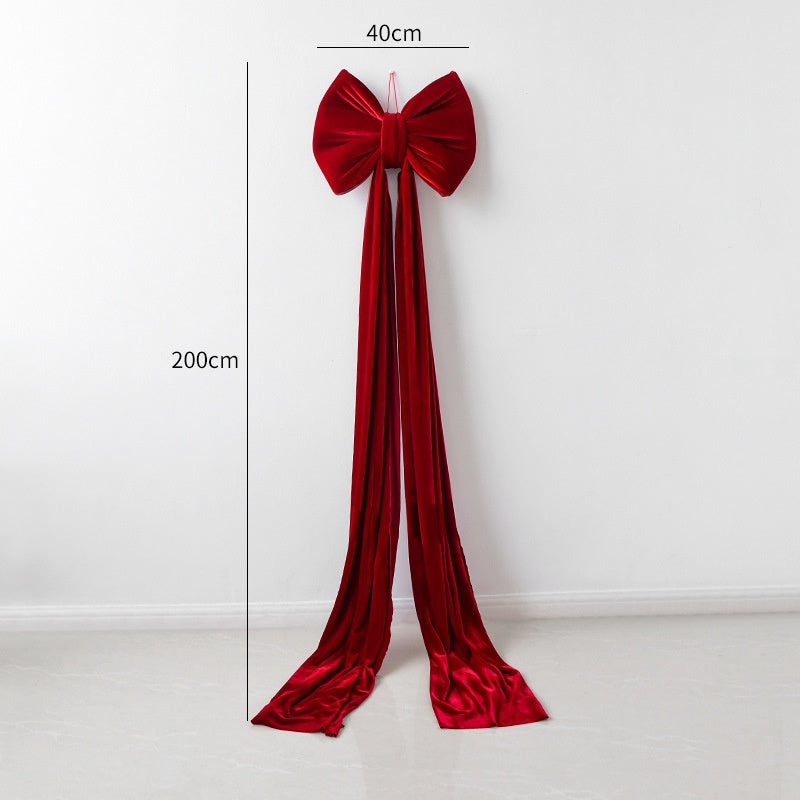 Festive velvet bow for Christmas tree or door decoration in warm tones