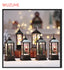 LED flame Christmas oil lamp with holiday figures on a cozy table setting