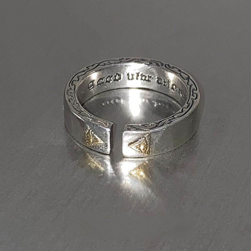 Men's faith cross ring showing adjustable band structure