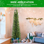 Green Christmas tree in entryway with gift boxes nearby