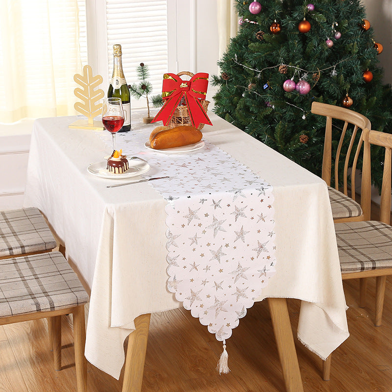 Christmas Star Snowflake Table Runner - Christmas table runner featuring decorative golden star and festive styling