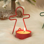 Gingerbread man shaped Christmas candlestick in red