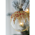 Twelve glass ball ornaments arranged together showing the complete set