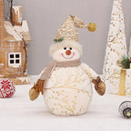 Long velvet snowman with pointed hat in festive setting