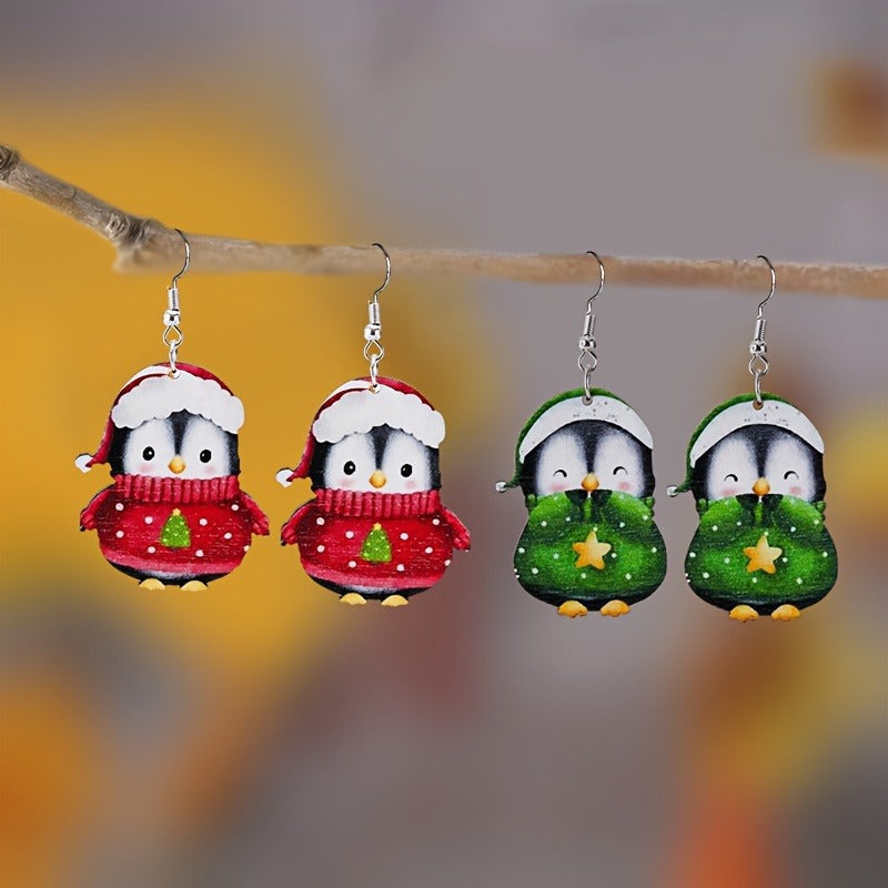 Festive cartoon penguin earrings with holiday colors for Christmas parties