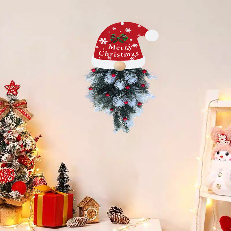 Festive pine garland pendant arrangement with other Christmas ornaments and decorations
